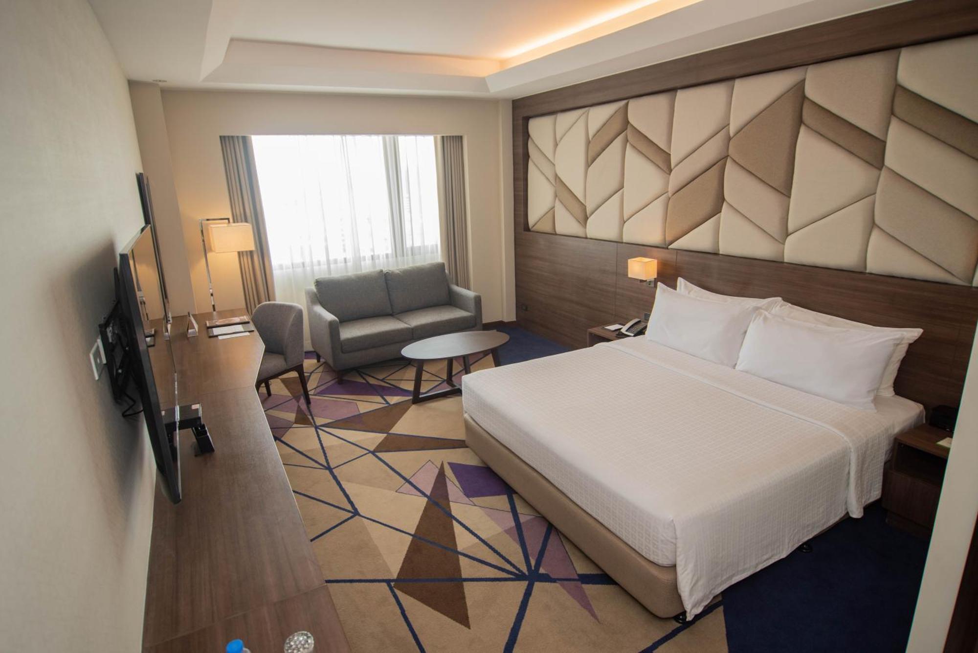 Luxent Hotel Кесон-Сити Экстерьер фото